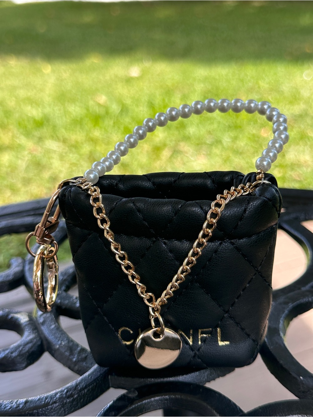 Black Quilted Mini Bag Charm with Gold Chain and Pearl Handle